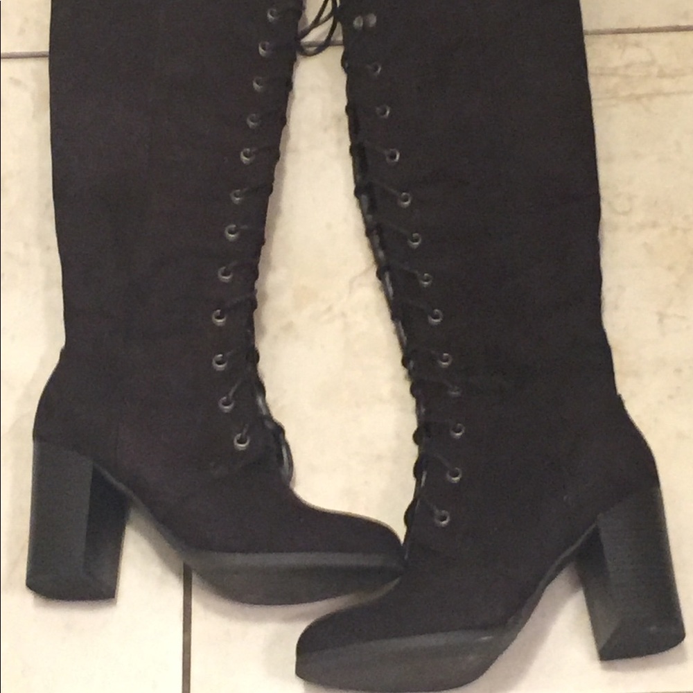 Knee high black lace up boots